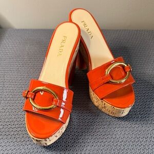 Prada Women's Orange Patent Leather Mules with Gold Buckle